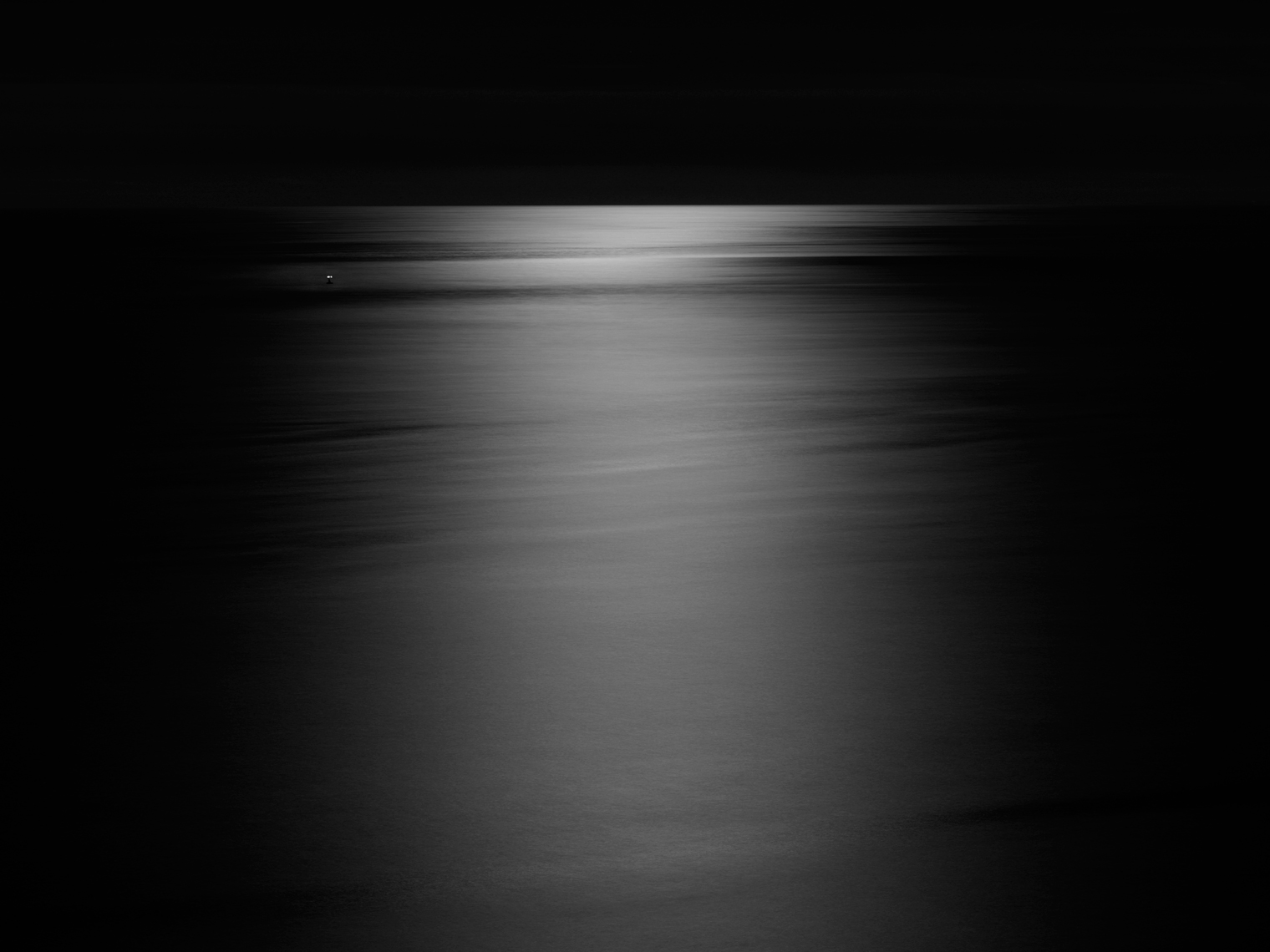 Jon Wyatt Photography - Moonlight on the sea at East Nash Buoy at night at Witches Point in South Wales