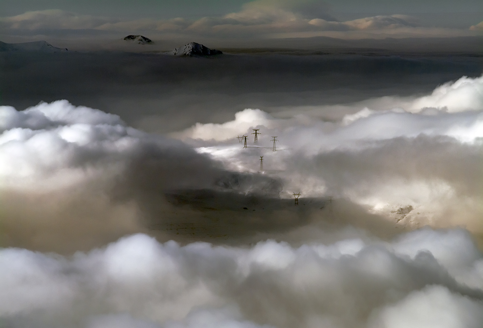 Jon Wyatt Photography - Low clouds over La plagne ski area