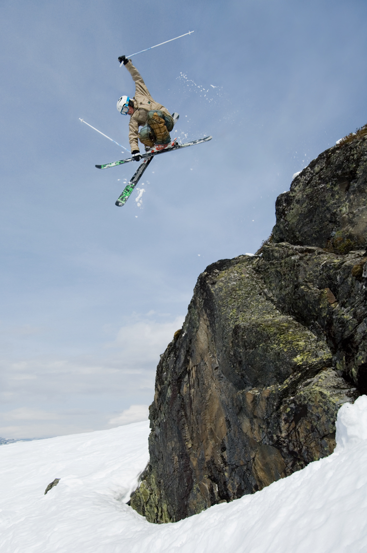 Jon Wyatt Photography - skier jumping off cliff